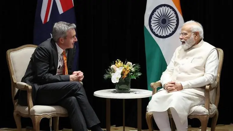 PM Modi meets prominent business leaders in Australia, invites investments in India PM Narendra Modi with Australian CEO Paul Schroder