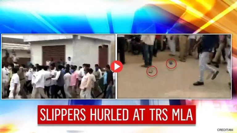 Locals pelt slippers at TRS MLA during visit to flood-affected Medipally area in Hyderabad Telangana