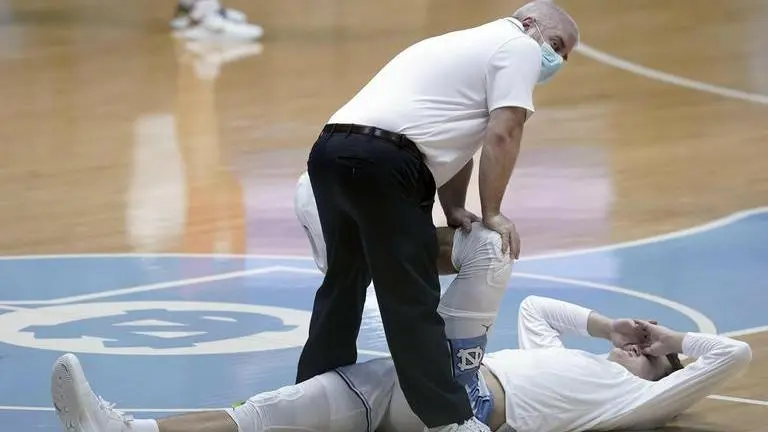 Athletic trainers adapt to chaos of sports in a pandemic