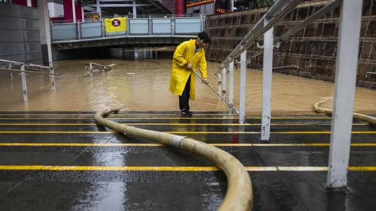 Extreme rain and flash floods in Hong Kong kills two, hundreds evacuated