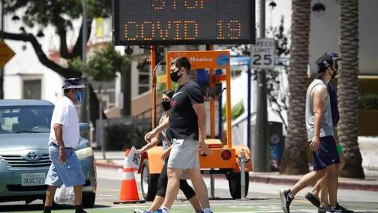 California sets stay home order amid virus surge