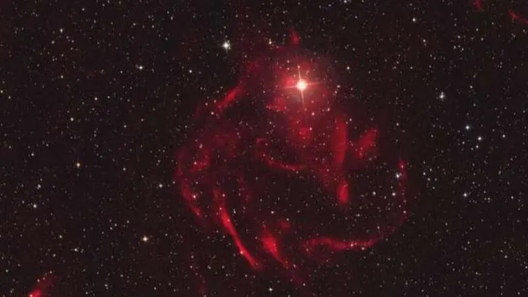 Astronomers discover new nebula with evolving stars underneath its dust: Reports nebula