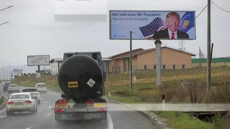 Billboard in Kosovo wishes Trump a fast recovery