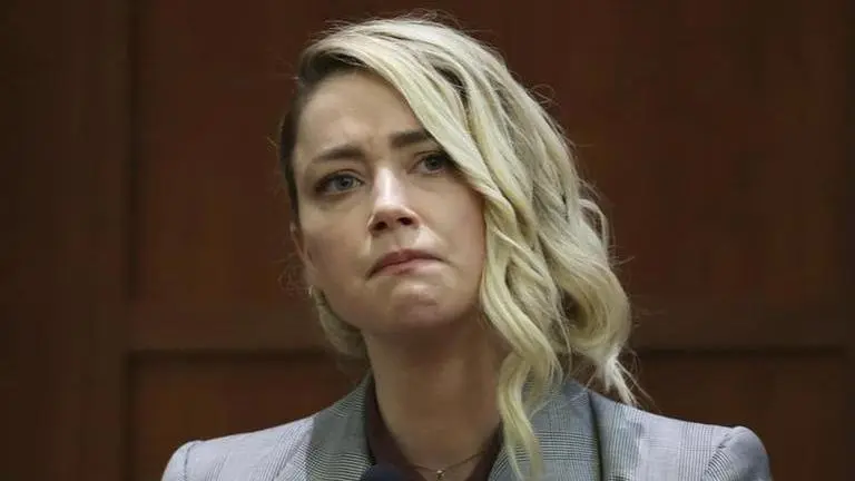 Amber Heard hires new legal team to appeal verdict in Johnny Depp defamation case Amber Heard