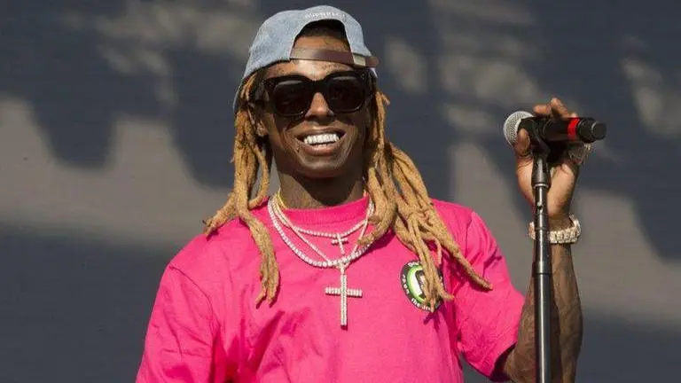 Rapper Lil Wayne charged with federal gun offense in Florida