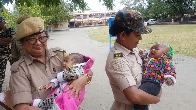 Netizens hail Assam Policewomen for attending TET aspirants' babies policewomen