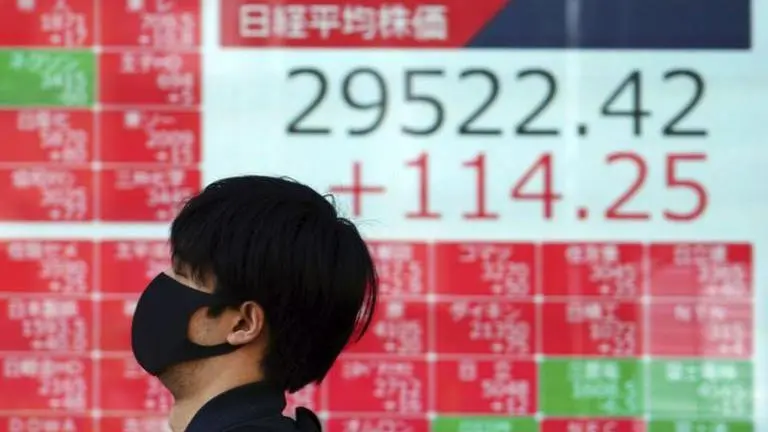 Asian shares advance despite Wall Street retreat