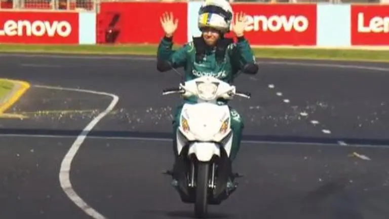 Sebastian Vettel's scooter 'joyride' at Australian GP forces F1 to take drastic step Sebastian Vettel driving scooter on F1 track