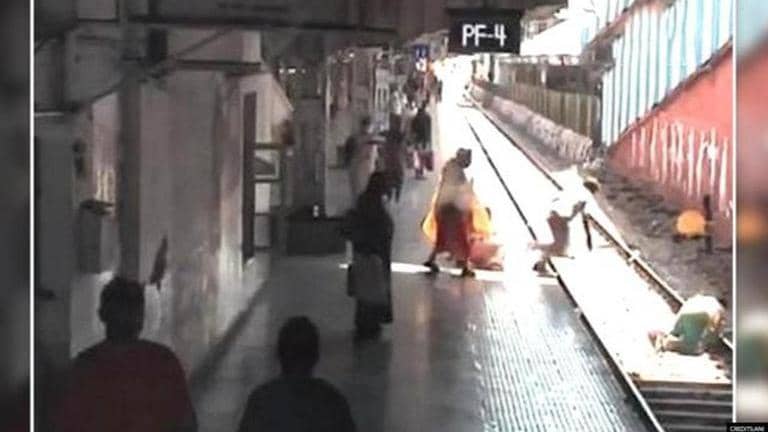 Policeman saves woman from being run over by train in Mumbai's Dadar ...