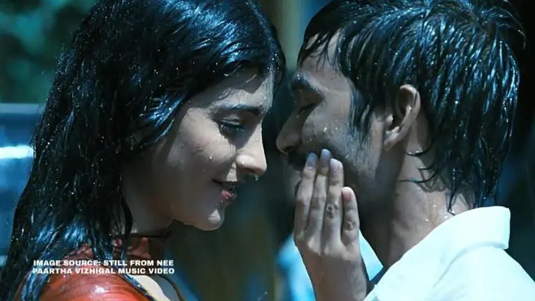As Dhanush's '3' movie completes 9 years today, fans trend "9 years of Moonu" on Twitter Image: Dhanush & Shruti Hasaan/ Credit: Still from Nee Paatha Vizhighal Music video