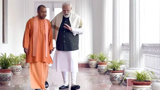 Uttar Pradesh chief minister Yogi Adityanath with Prime Minister Narendra Modi at Raj Bhavan in Lucknow
