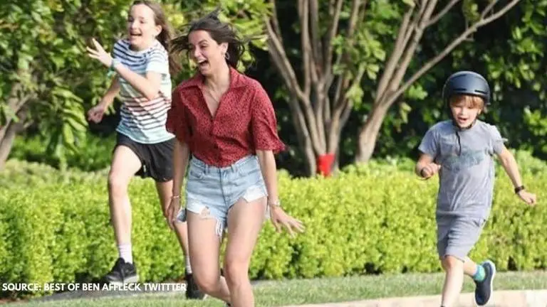 Ben Affleck's beau enjoys a day out with his kids as they joke around with her poster Ben Affleck
