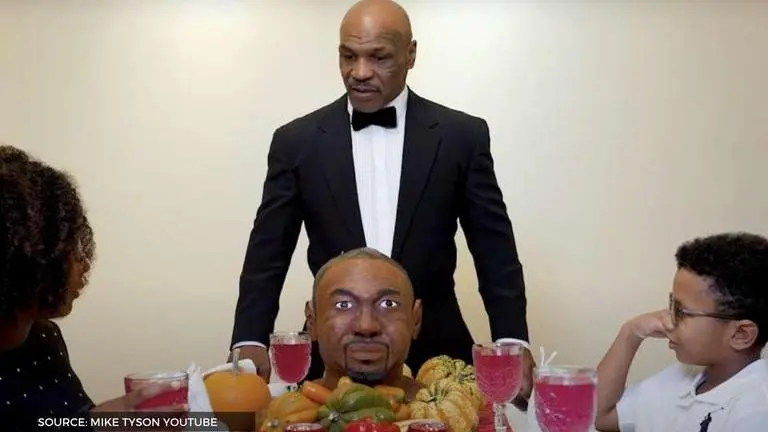 Mike Tyson eats Roy Jones Jr's EAR in epic Thanksgiving clip ahead of boxing return: Watch mike tyson