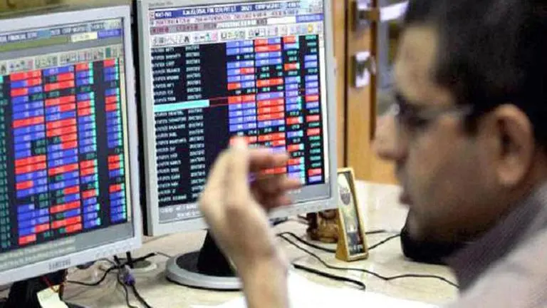 Sensex rallies over 1,265 pts; Nifty reclaims 9,100 level