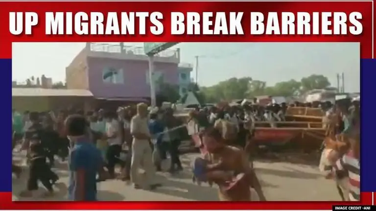 Uttar Pradesh migrants break police barriers in Madhya Pradesh's Rewa to enter state Uttar Pradesh