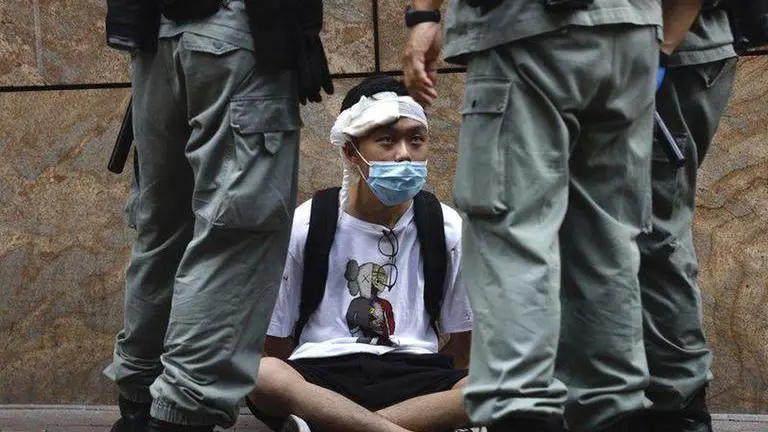 China says US action on Hong Kong 'doomed to fail'