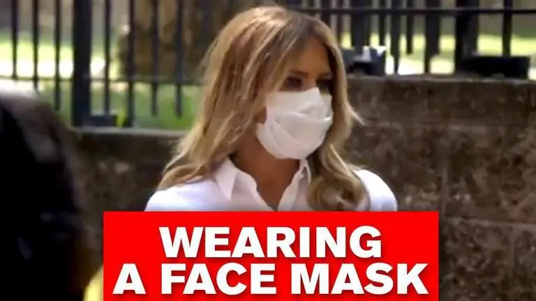 Trump family pivots on Covid masks; First Lady Melania now makes point to be seen with one Melania Trump spotted wearing a face mask in public during visit