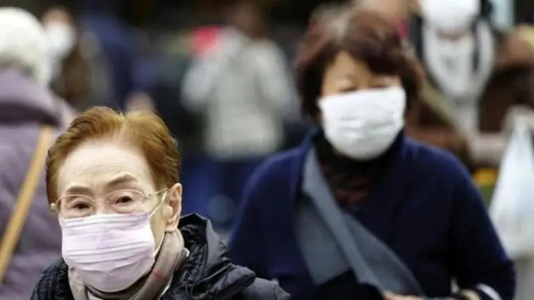 WHO says coronavirus is spread by respiratory droplets, not through air