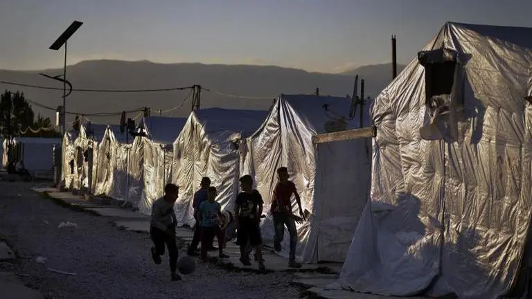 At least 6 killed in Syria's shelling of tent settlement