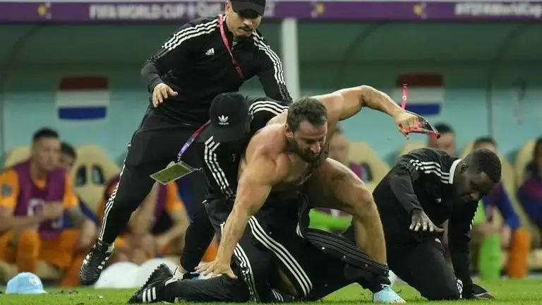 Watch: Fan runs on the pitch right after Messi's penalty vs Netherlands, meme fest ensues Pitch invader, Netherlands vs Argentina