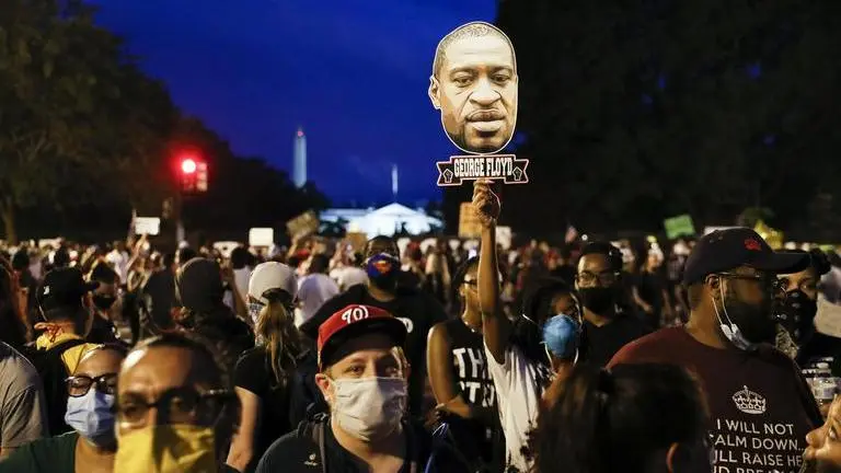 Largely peaceful protests against police brutality march on