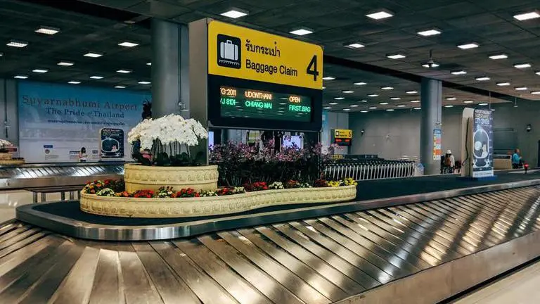 Drunk man gets lost in airport's luggage carousel network, takes ride on conveyor belt Drunk man