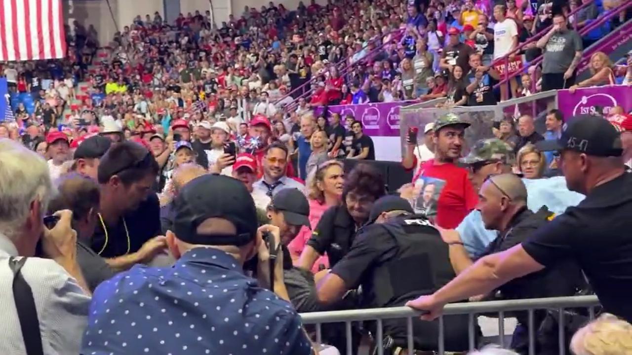 A man at Donald Trump's rally in Johnstown, Pennsylvania, stormed into the press area as the former president spoke Friday but was surrounded by police