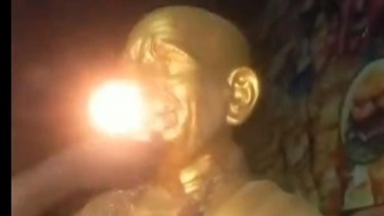  A recent video on social media captures a teenage boy lighting a firecracker inside the mouth of a mahatma gandhi statue in telangana.