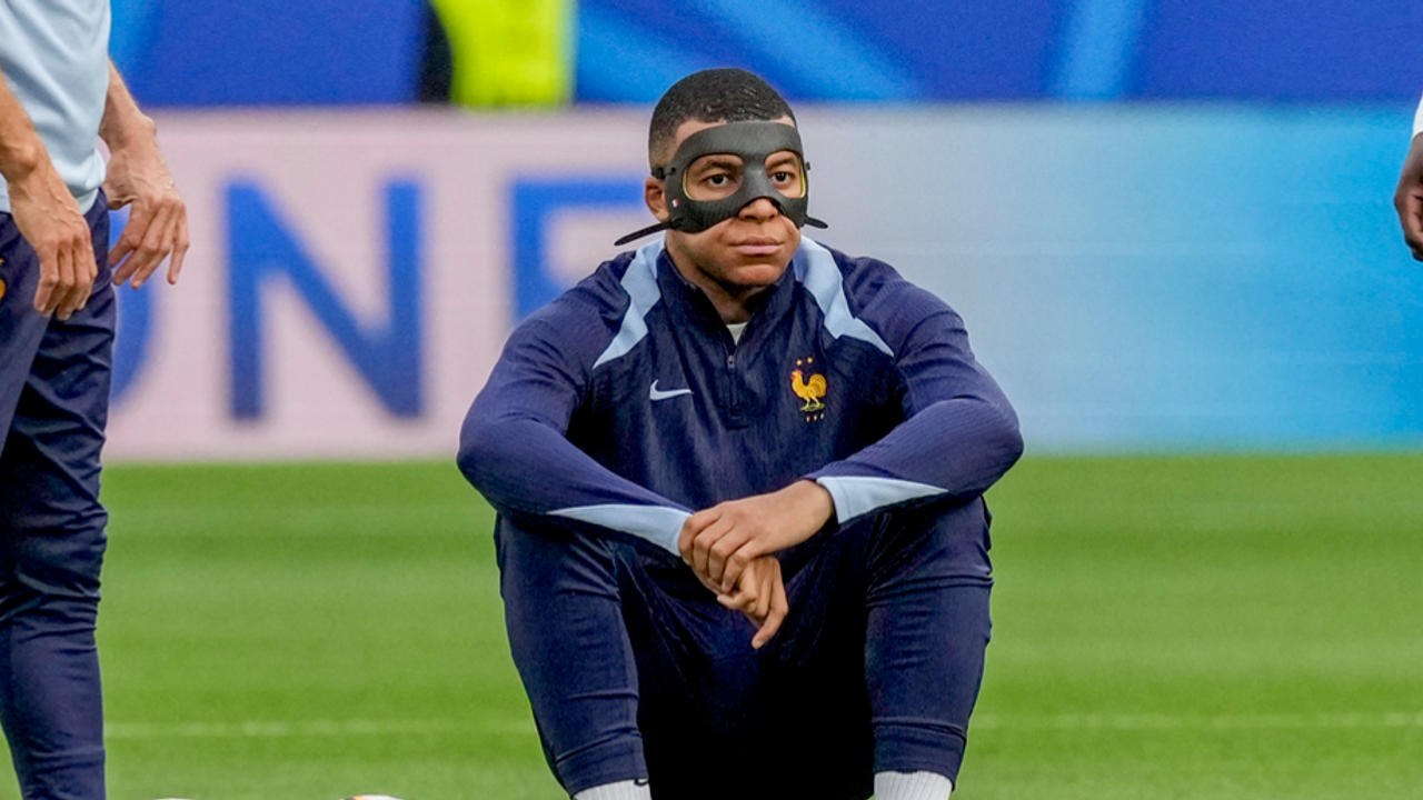 Kylian Mbappe warms up for France vs Netherlands