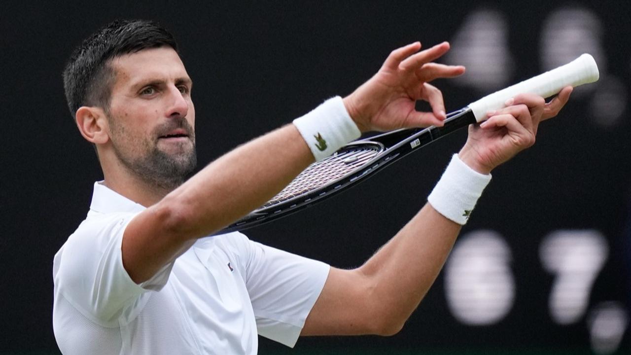 Novak Djokovic celebrates reaching Wimbledon Finals