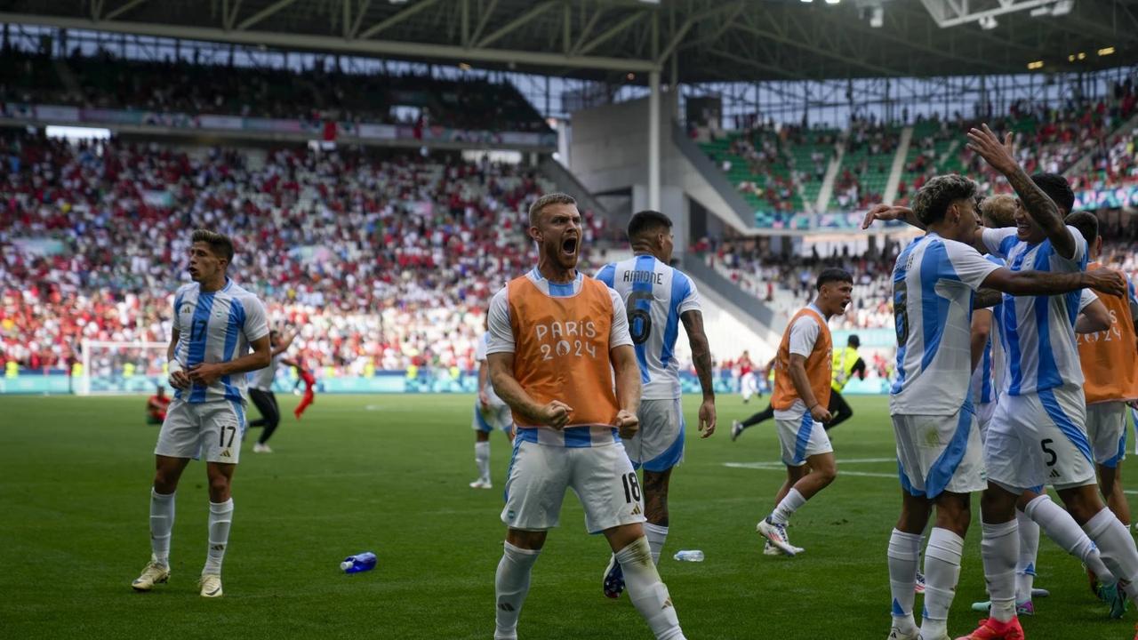 Argentina players celebrate after scoring a goal