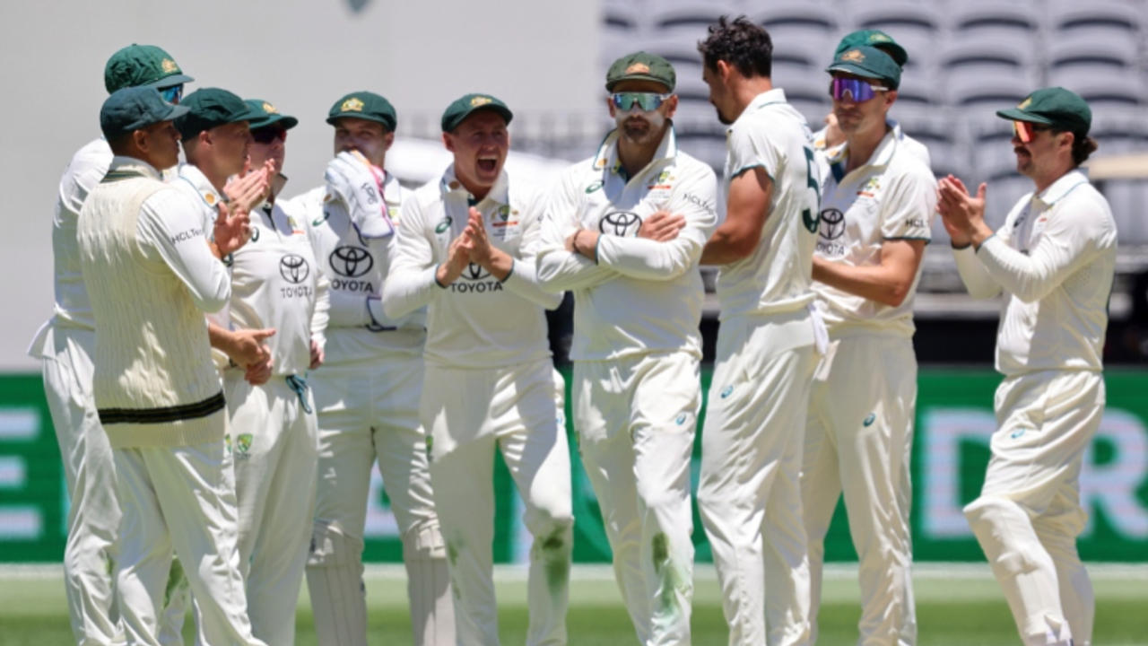 Australian players celebrate the fall of an Indian wicket during the IND vs AUS Perth Test match