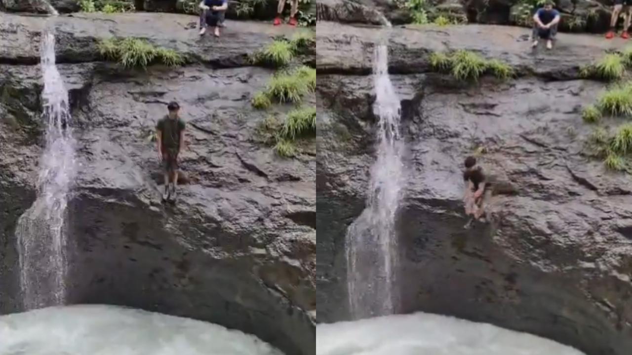 Man jumps into an overflowing waterfall at Tamhini Ghat in Maharashtra