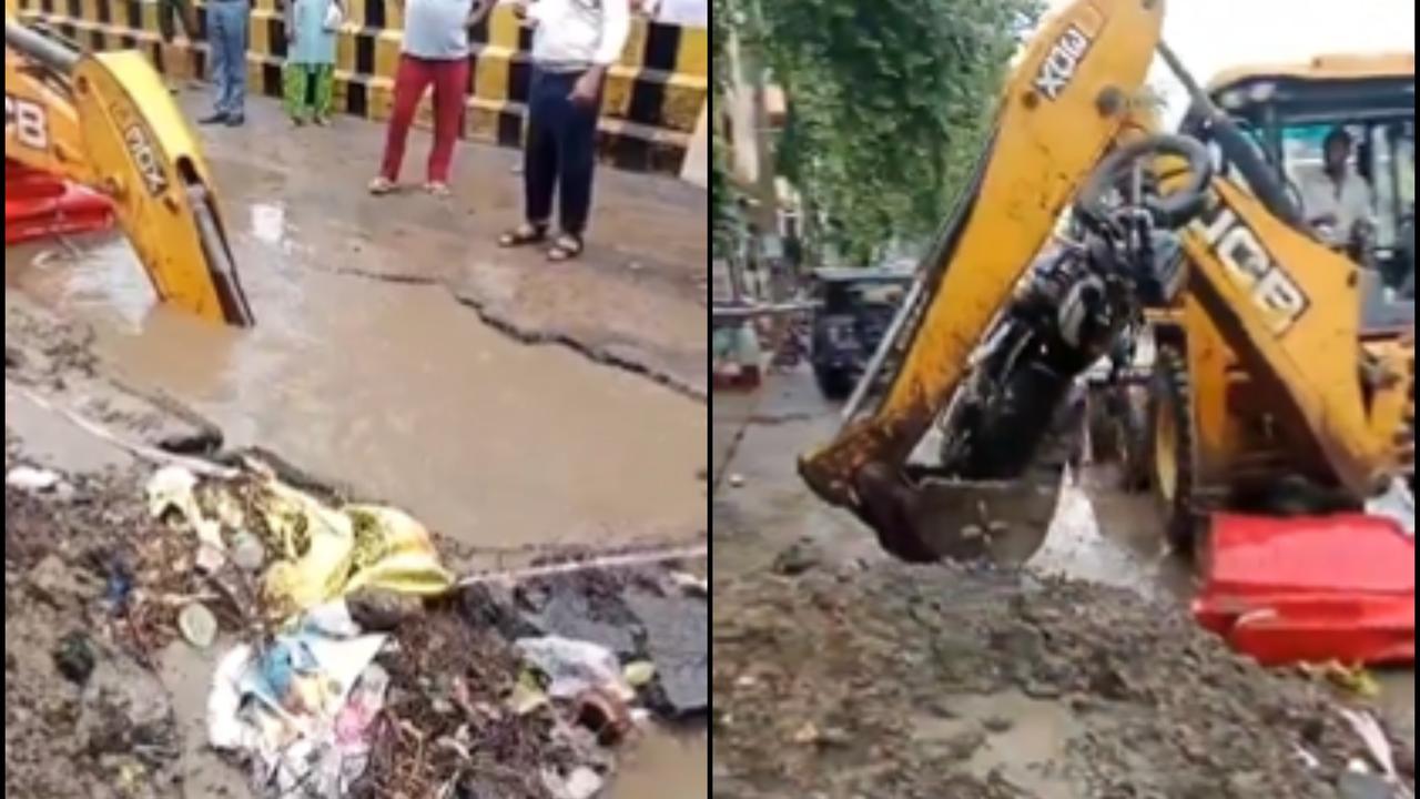 Bike Rider Rescued After Road Collapse Amidst Heavy Rain in GurugramBike Rider Rescued After Road Collapse Amidst Heavy Rain in Gurugram