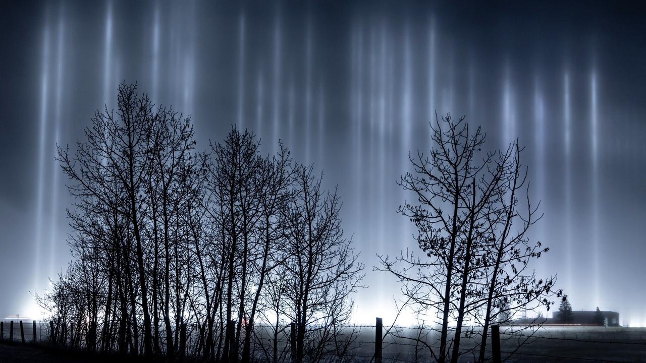 Breathtaking Pillars of Light Illuminate the Sky Over Central Alberta