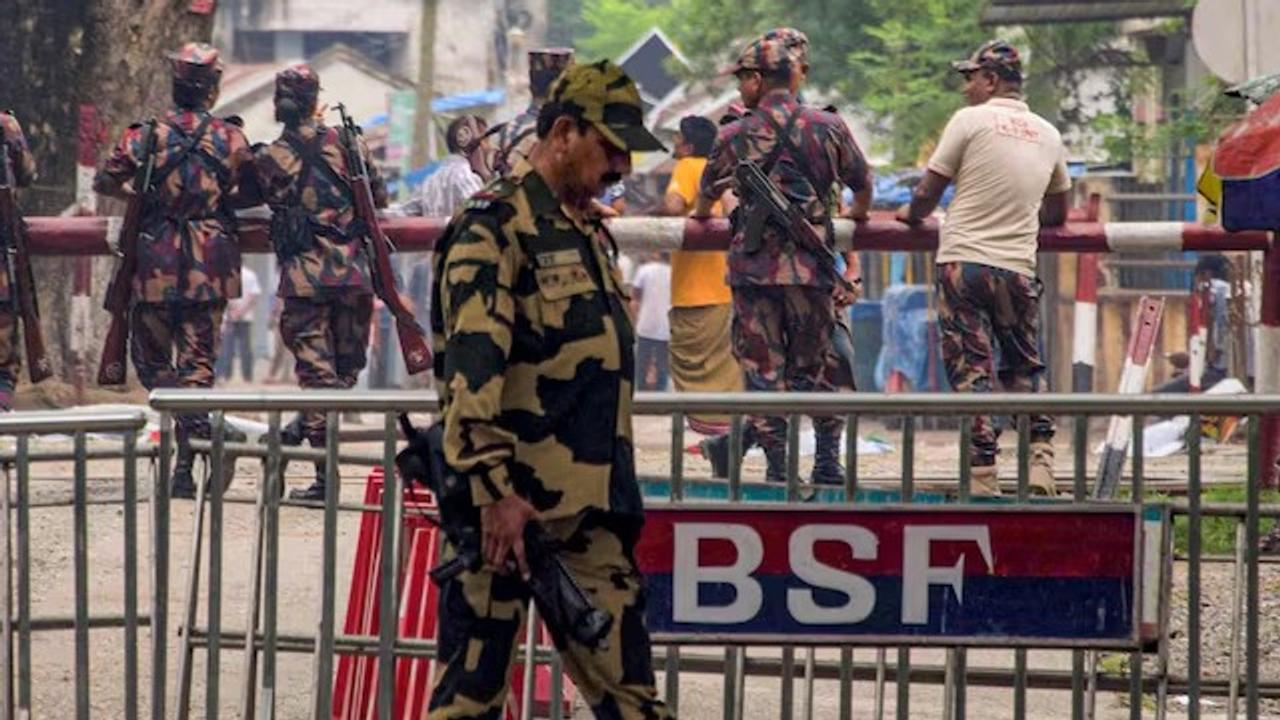  BSF personnel stands guard at the India-Bangladesh border checkpost.