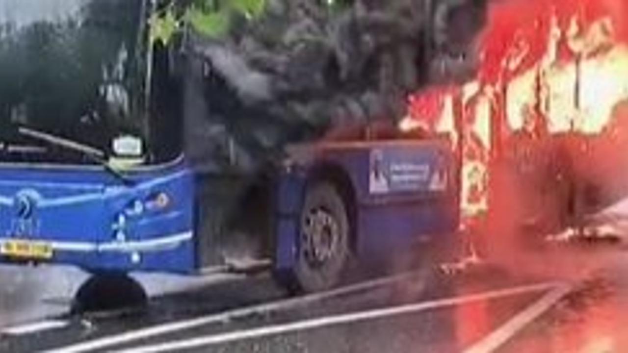 Bus Catches Fire in Middle of Delhi Road Amid Rain | Watch