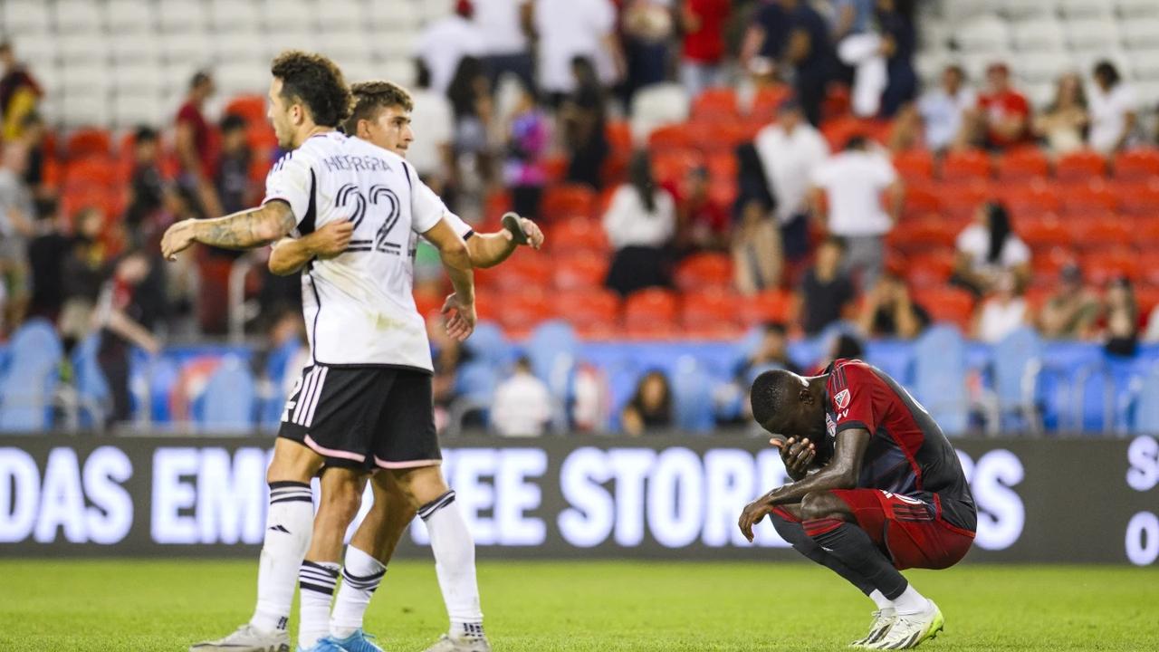 D.C. United players celebrating.