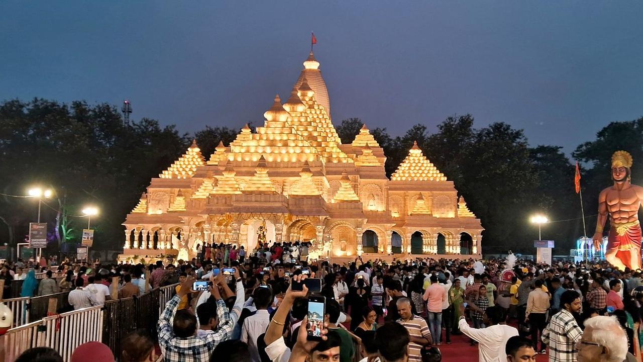 Devotees at Ram Mandir-themed Pandal