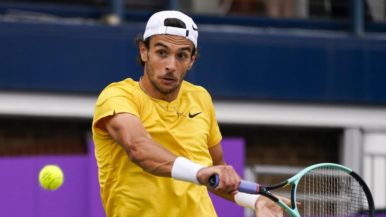 Lorenzo Musetti reached the final at the grass-court Queen’s Club after outlasting Jordan Thompson 6-3, 3-6, 6-3 on Saturday and will face Tommy Paul for the title.