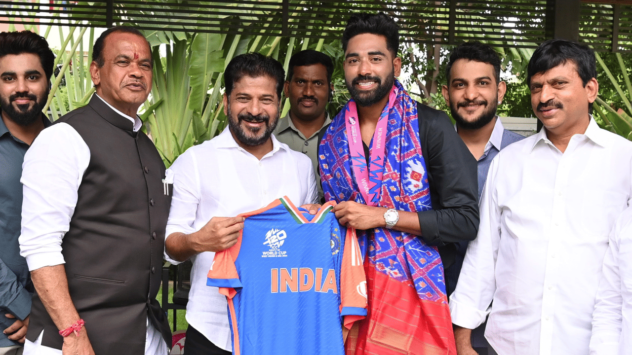 Telangana CM Revanth Reddy with Indian Cricketer Mohammed Siraj