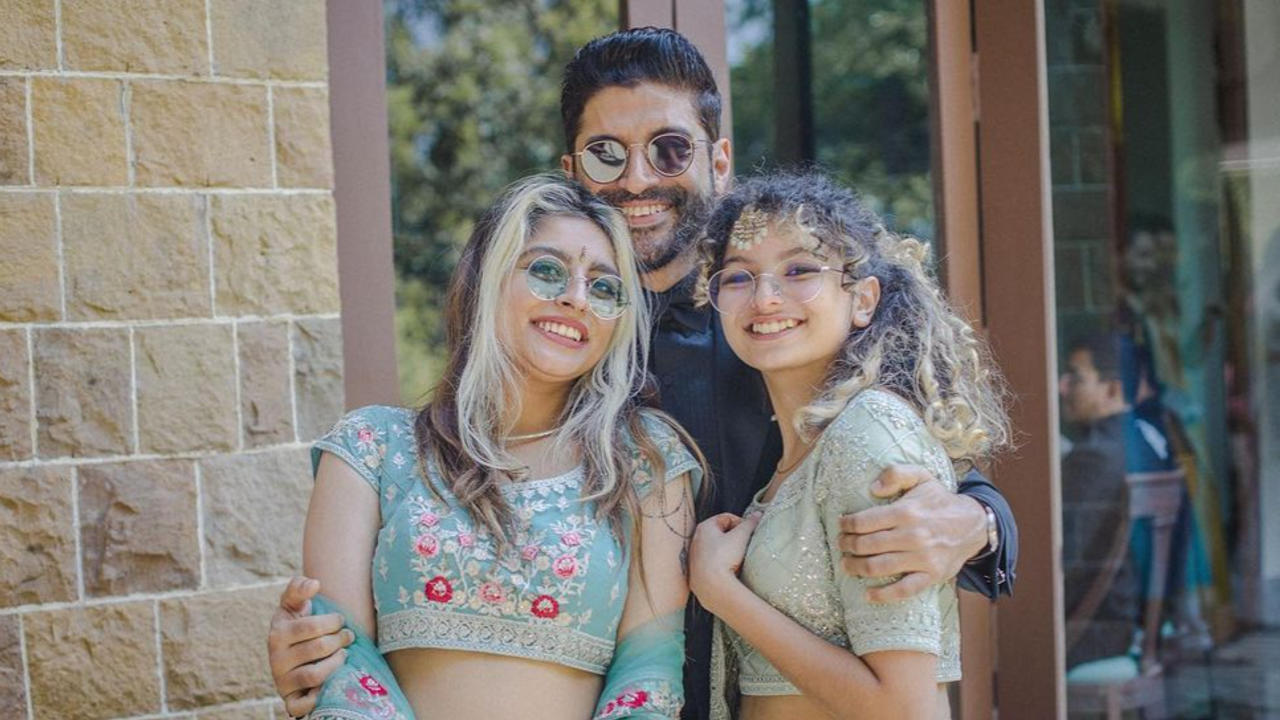 Farhan Akhtar with his daughters.