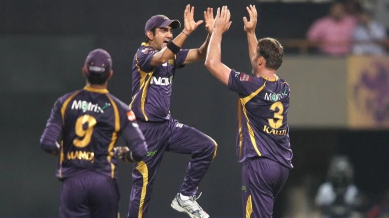 Gautam Gambhir, Manoj Tiwary and Jacques Kallis celebrate a fall of wicket