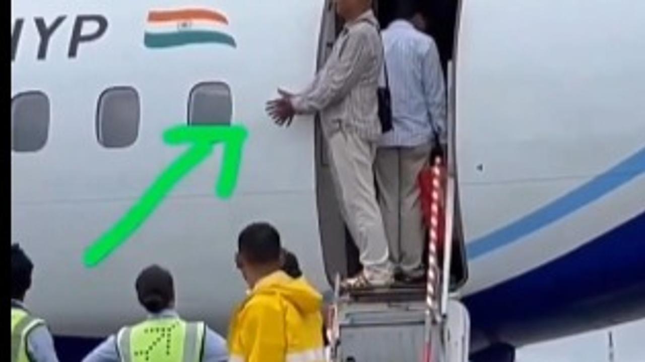 In the viral video circulating online, a man is seen preparing dipping tobacco while entering a plane