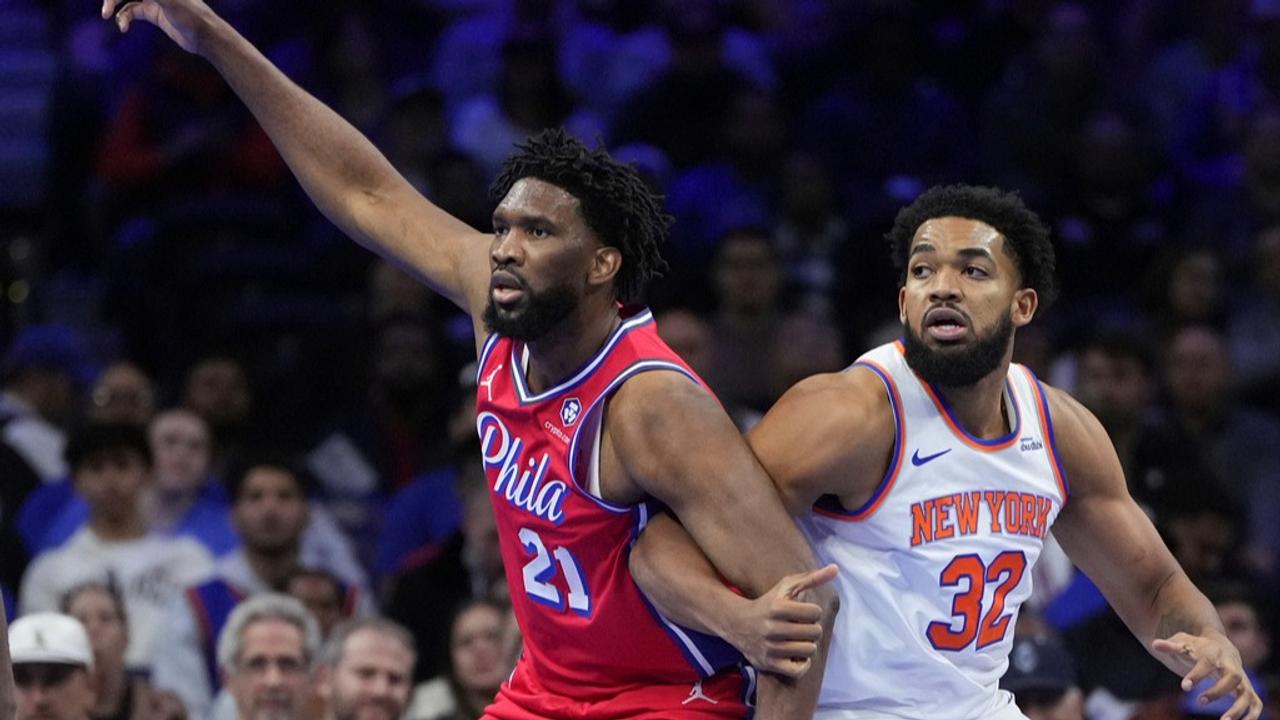 Joel Embiid in action against New York Knicks Carl Anthony Towns