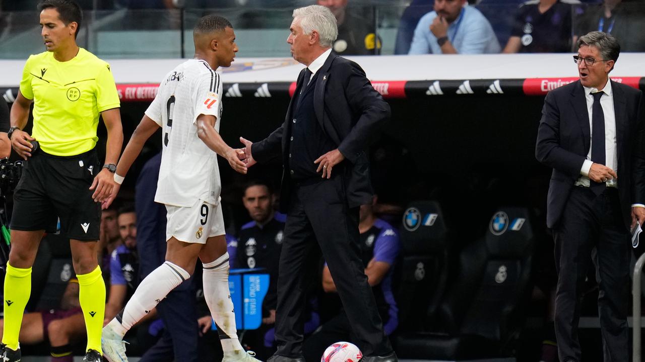 Kylian Mbappe and Carlo Ancelotti