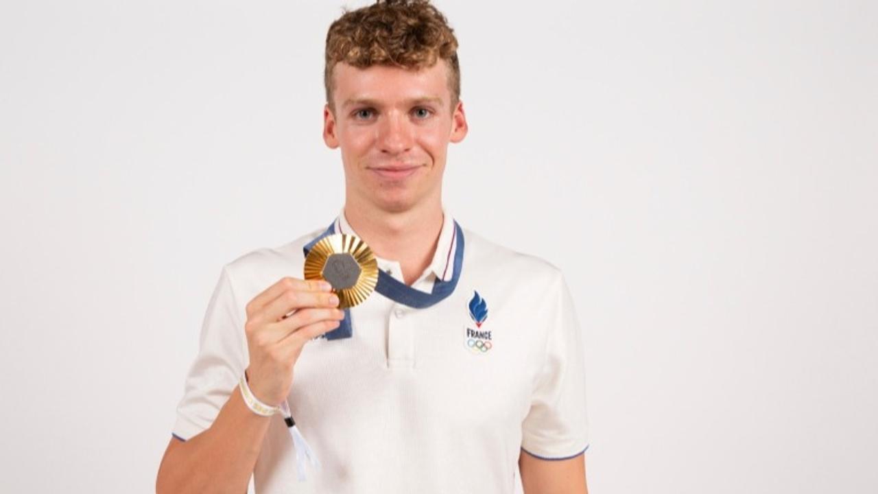 Léon Marchand with his Olympic Gold Medal