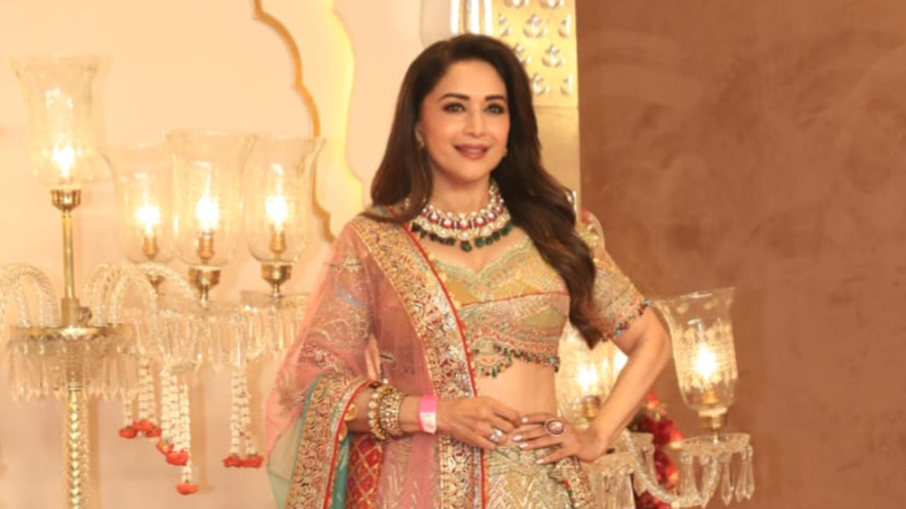 Madhuri Dixit lightened the Ambani Wedding with her million watt smile, and charming senseof fashion.