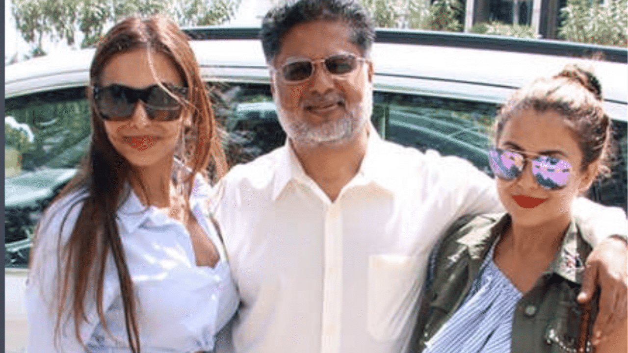 Malaika and Amrita Arora with their father