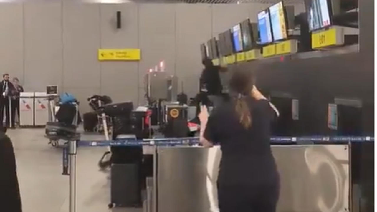 Man destroys American Airlines counter at Chile Airport.